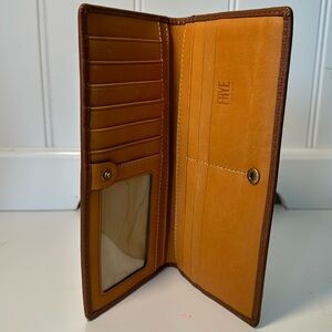 Frye wallet normal wear and tear.